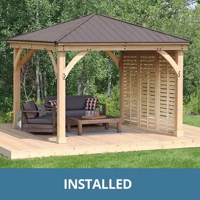 Professionally Assembled Meridian 12 ft. x 12 ft. Cedar Patio Gazebo with 12 ft. Privacy Wall and Brown Aluminum Roof